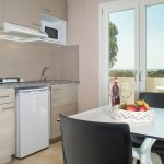 Kitchen with a dining table for two