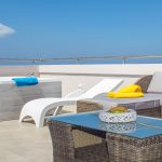 Private terrace with a hot tub