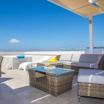 Private terrace with a hot tub